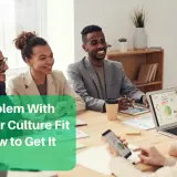 Diverse team in a meeting discussing hiring for culture fit.