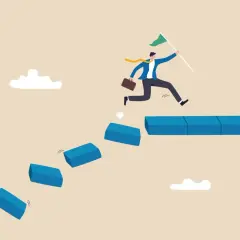 A businessman leaps across broken steps, holding a flag, illustrating how to handle a crisis situation by taking bold steps towards success.